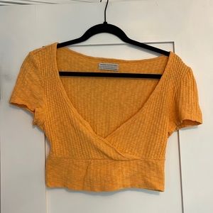 Urban Outfitters orange crop top